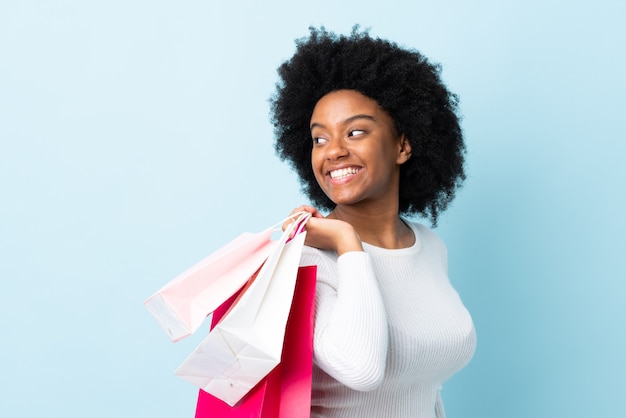 Premium Photo Young African American Woman Isolated On Blue