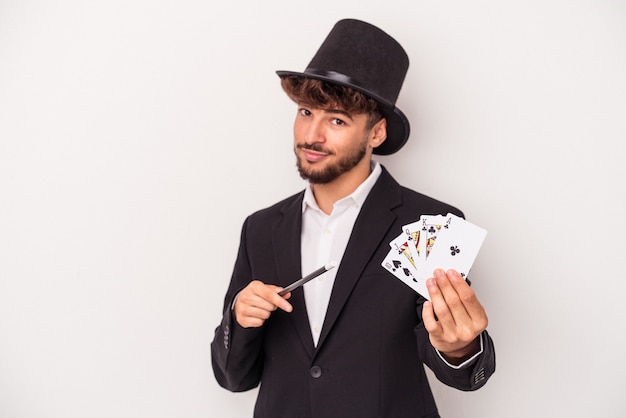 Premium Photo | Young arab wizard man holding a magic cards and wand ...