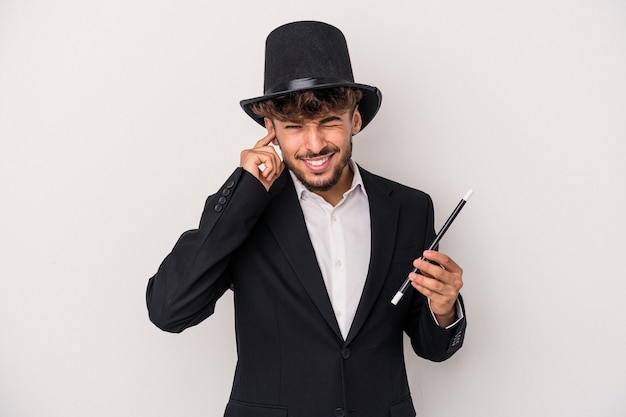 Premium Photo | Young arab wizard man holding a wand isolated on white ...