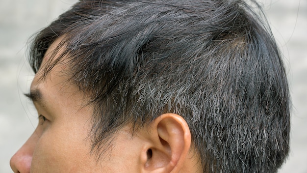 Premium Photo | Young asian man has a gray hair.