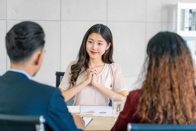 Premium Photo | Young asian woman graduate interviewing with two ...