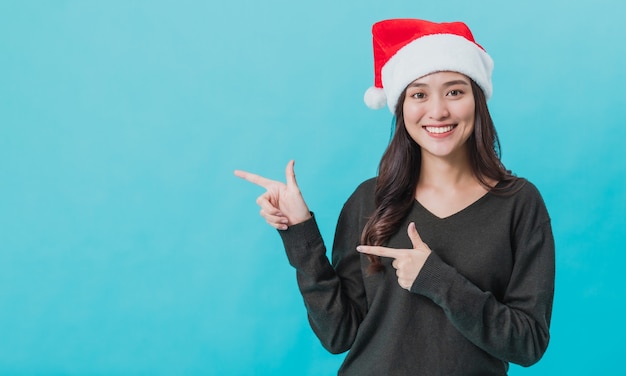 Premium Photo Young Asian Woman Wearing Santa Claus H