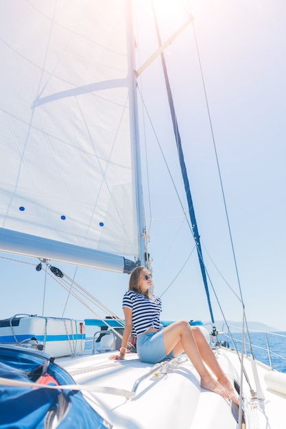 Premium Photo Young Beautiful Girl Relaxing On Yacht In Greece