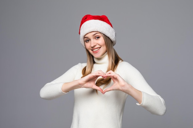 Premium Photo Young Beautiful Woman Wearing Christmas Santa Hat Over