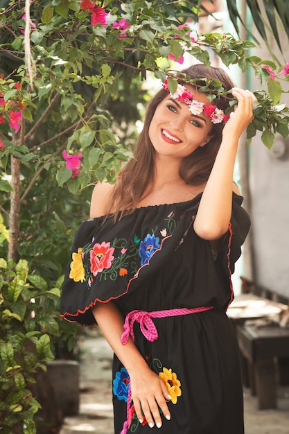 https://image.freepik.com/free-photo/young-beautiful-woman-wearing-traditional-mexican-dress-city-street_144962-10541.jpg