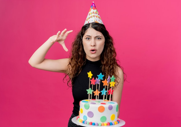 Free Photo | Young beautiful woman with curly hair in a holiday cap ...