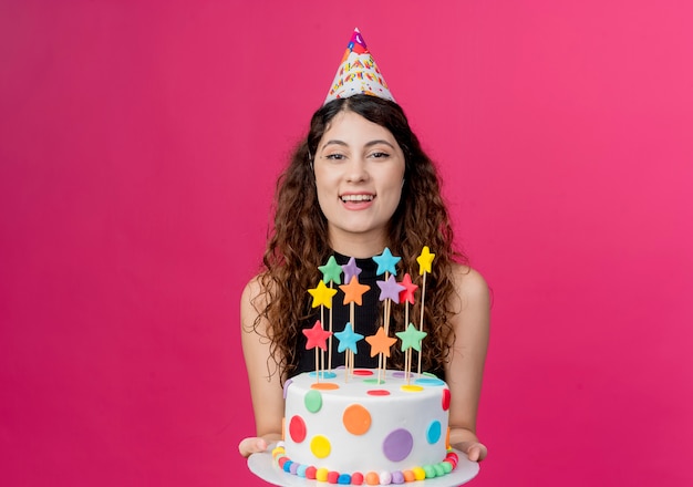 Free Photo | Young beautiful woman with curly hair in a holiday cap ...