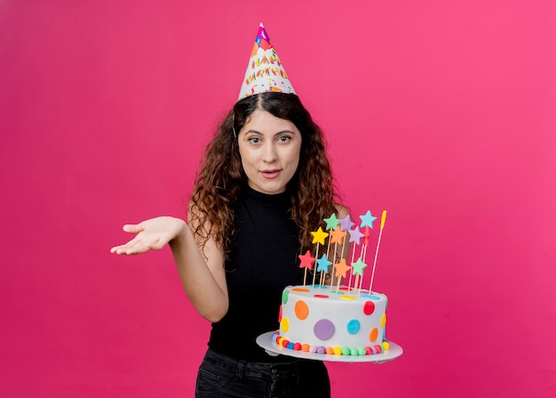 Free Photo | Young beautiful woman with curly hair in a holiday cap ...