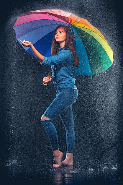 Free Photo Young Beautiful Woman With An Umbrella