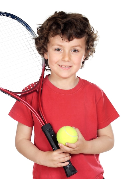 Young boy with tennis racket and ball | Premium Photo