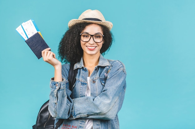 Premium Photo | Young brunette woman holding tickets and passport