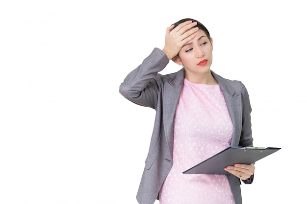 Young business woman stressed isolated on gray wall background Premium Photo