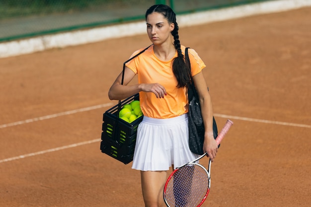 Free Photo Young Caucasian Woman Playing Tennis At Tennis Court Outdoors