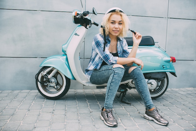 girls driving scooty