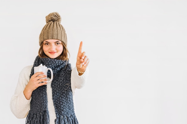Free Photo | Young cheerful woman in hat and scarf with cup of drink ...