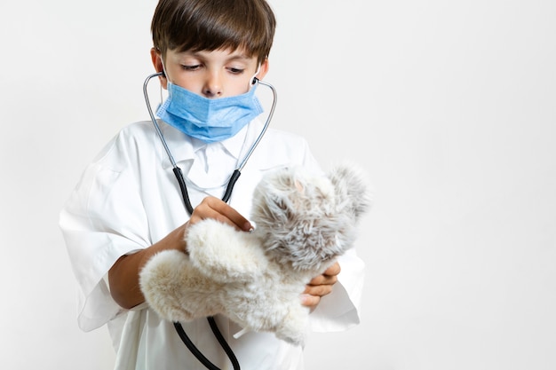 child with teddy