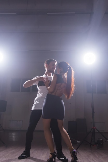 Premium Photo Young Couple Dancing Latin Dance Bachata Merengue