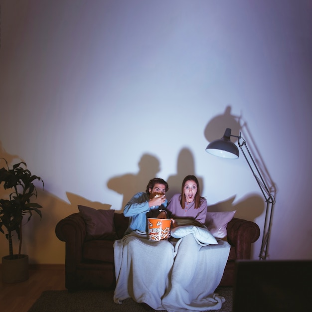 Young Couple Having A Movie Night Free Ph