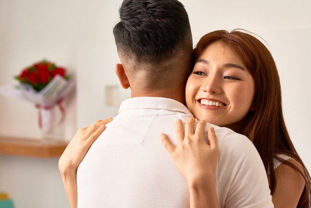 Premium Photo Young Couple Hugging Each Other 