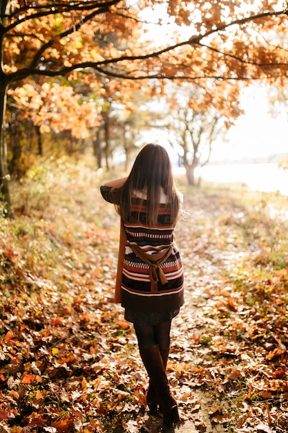 Free Photo | Young couple in love. a love story in the autumn forest park