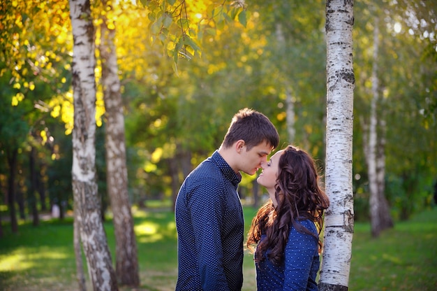 Premium Photo Young Couple In Love Walking In The Park Valentines Day