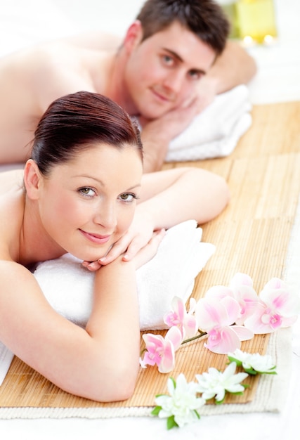 Premium Photo Young Couple Lying On A Massage Table 7849