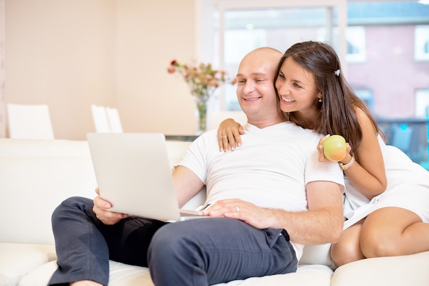 Image result for couple relaxing on sofa