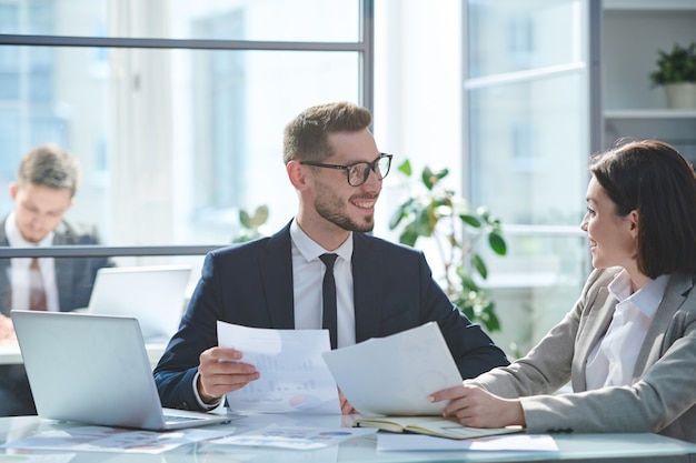 Premium Photo | Young economists working