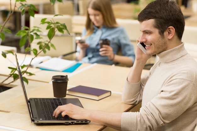 Young entrepreneurs working together at the office Premium Photo