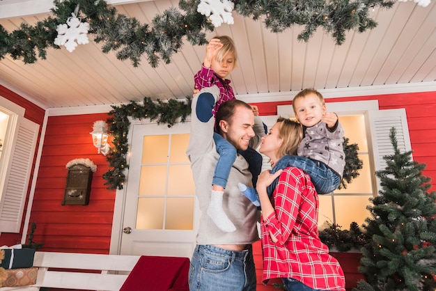 Free Photo | Young family celebrating christmas