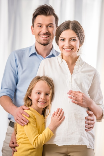 Premium Photo | Young family spend time together at home.