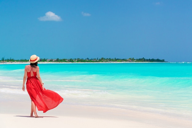 red dress on beach