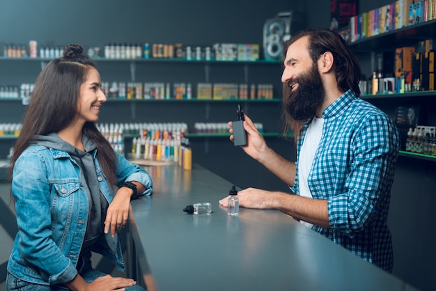 Premium Photo The Young Girl Came To The Vape Shop And Choosing Vape