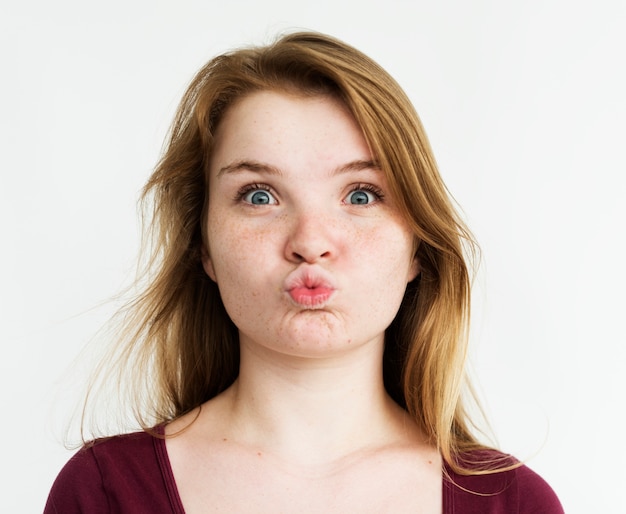 Premium Photo | Young girl kissing gesture studio portrait