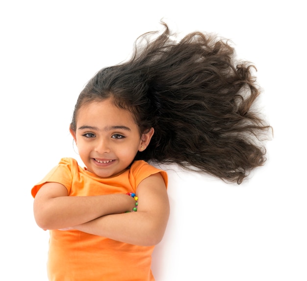 Premium Photo | Young girl with beautiful hair on white background