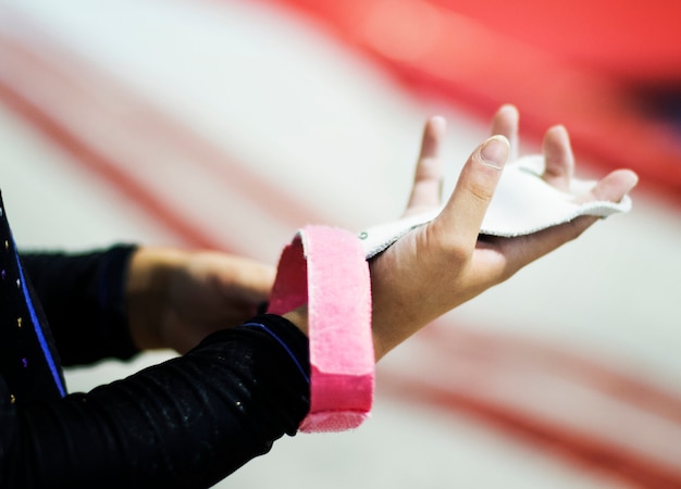 Premium Photo | Young Gymnast Wearing A Grip Bar To Her Palm