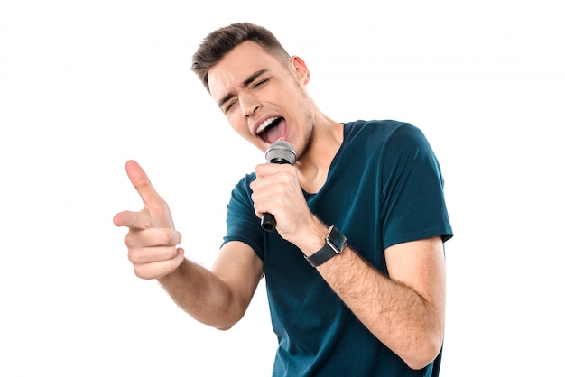 Premium Photo Young Handsome Guy Singing Karaoke Expressively 6802