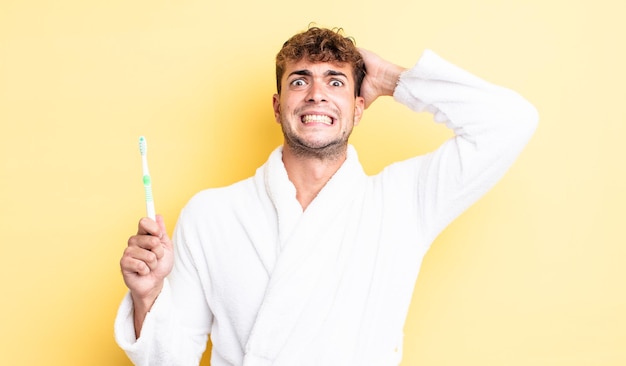 Premium Photo | Young handsome man feeling stressed, anxious or scared ...