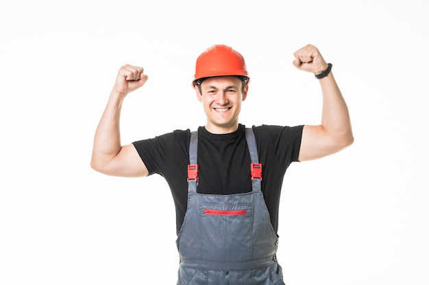 Premium Photo | Young happy handyman arms up