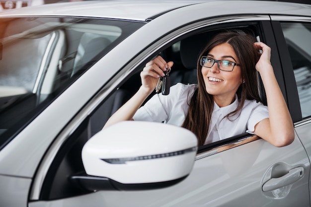 Young Happy Woman Near The Car With Keys In Hand Premium Photo