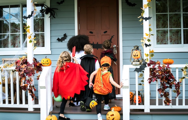 Free Photo Young Kids Trick Or Treating During Halloween