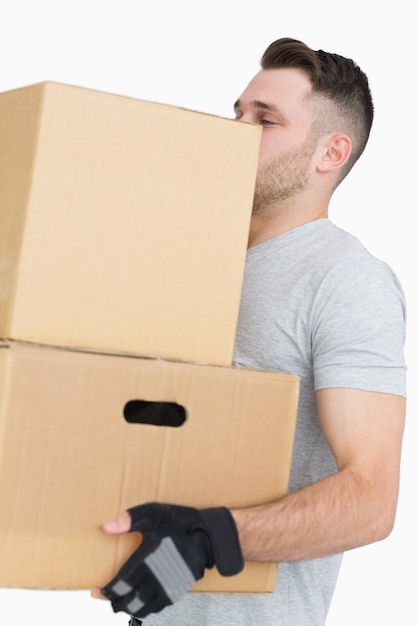 Premium Photo | Young Man Carrying Package Boxes