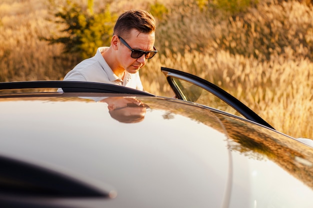 Free Photo Young Man Getting In The Car