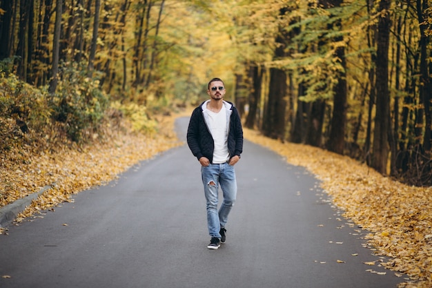 Free Photo Young Man Standing On A Road In An Autumn Park