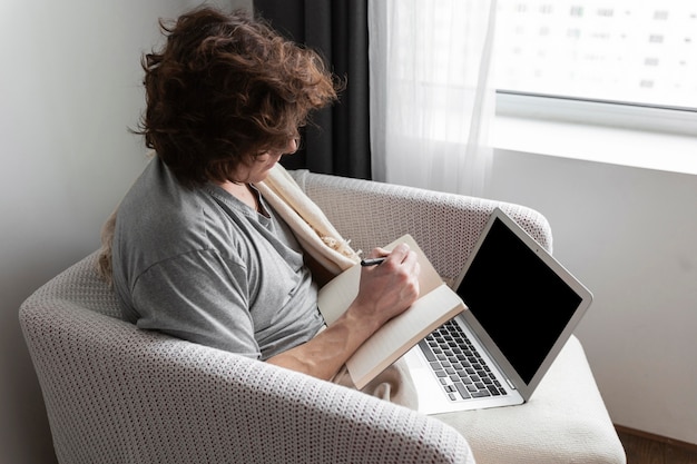 Free Photo | Young man talking to his doctor by videocall