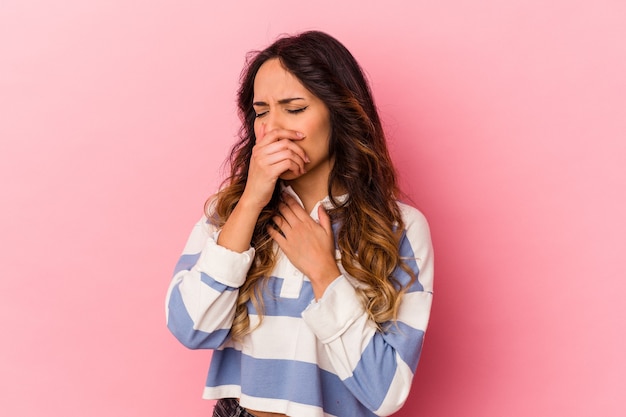 Premium Photo | Young mexican woman isolated on pink background suffers ...