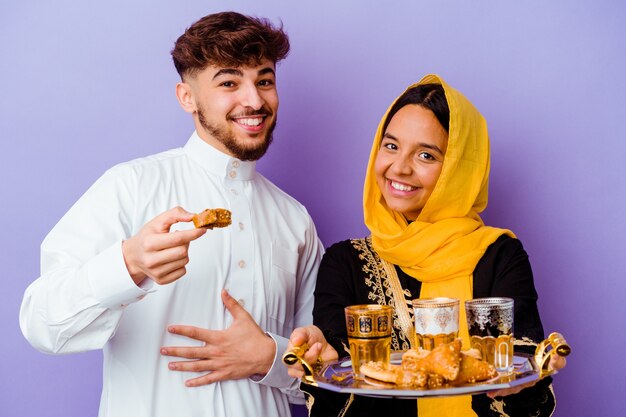 Premium Photo Young Moroccan Couple Drinking Tea Celebrating Ramadan