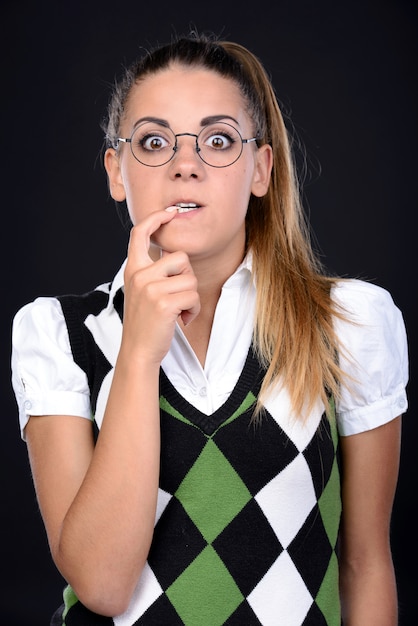 Young Nerd Woman Crazy Expression In Glasses Premi