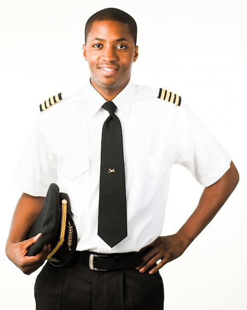 Premium Photo | Young pilot isolated on white