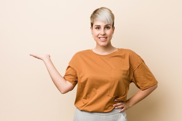 Young Plus Size Woman With Short Hair Showing A On A Palm And